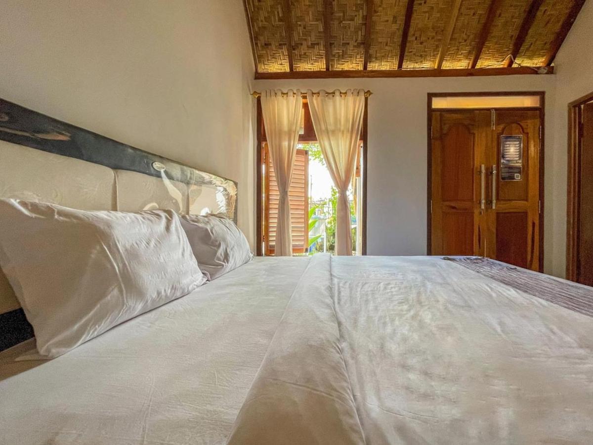 Aira Homestay Near Pantai Kuta Mandalika Mitra Reddoorz Bumbang Exterior foto